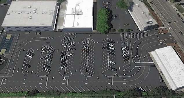 large parking lot with some cars